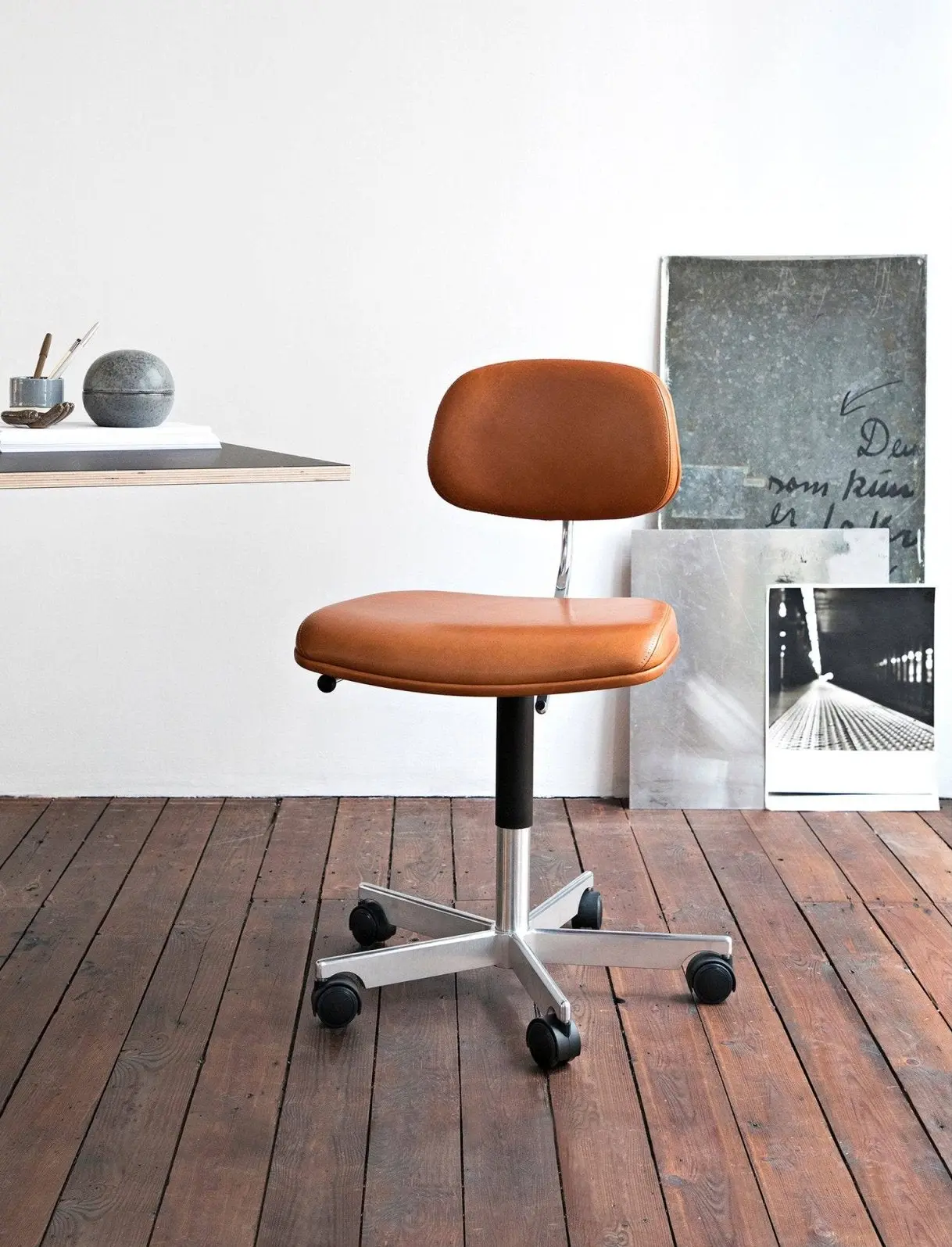 Kevi 2534U chair in ultra leather staged beside ColourBox shelving and Hokkaido cabinets.